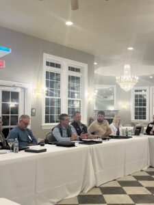 Strategic Planning Work Group - Team Members Sitting Around a Table