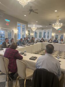 Strategic Planning Work Group - Team Members Sitting Around a Table (4)